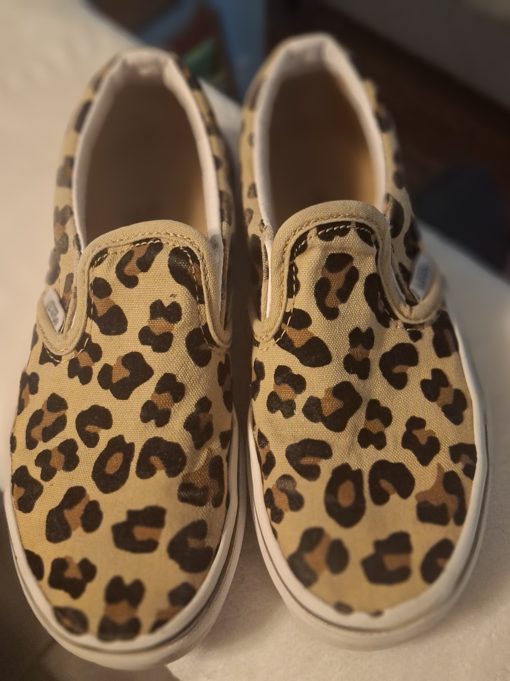 Vans Kids Leopard Slip-On Sneakers in Tan and Black